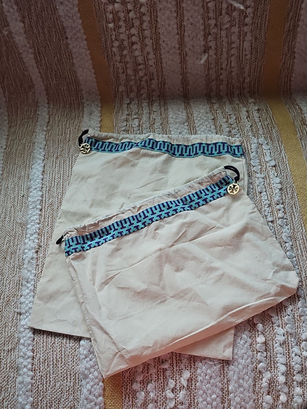 Tory Burch Cream Canvas Drawstring Bags with Blue Geometric Trim